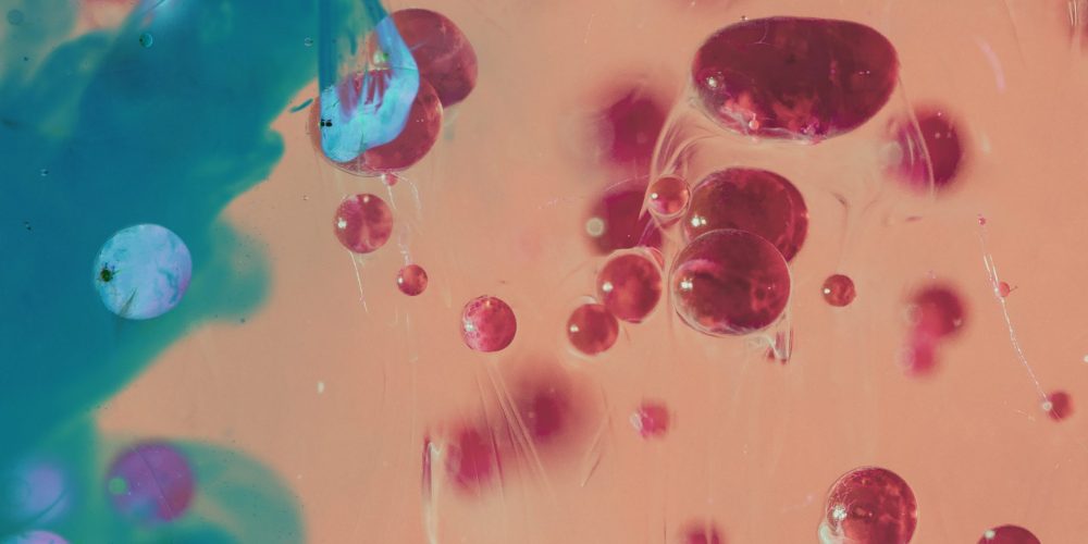 contrast-pink-abstract-pebbles-with-blue-spheres